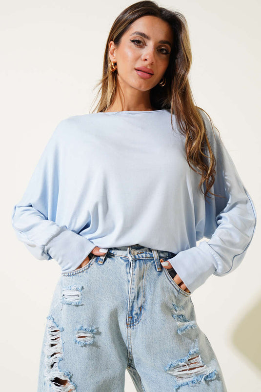 Blusa ampia con maniche a pipistrello blu