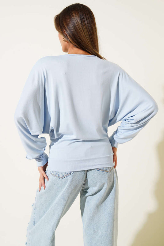 Blusa ampia con maniche a pipistrello blu
