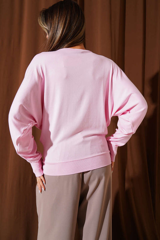 Chemisier rose ample à manches chauve-souris