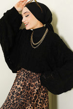 Pull en tricot ajouré à manches chauve-souris noir