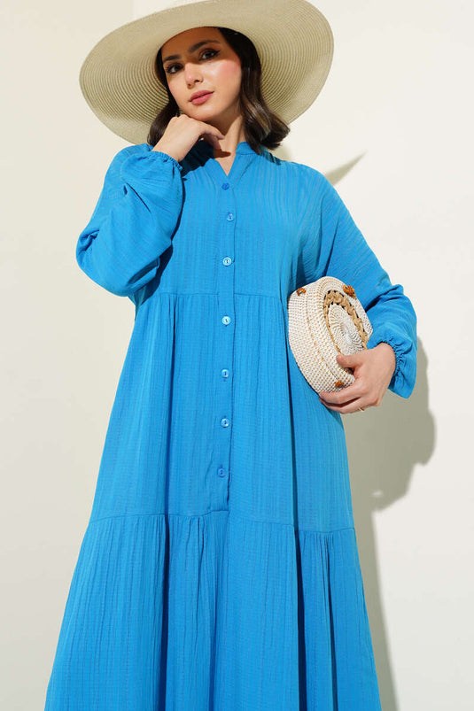 Halflange jurk met knopen en plooien in blauw