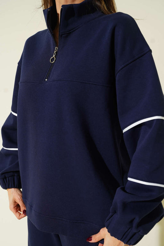 طقم مزدوج من ثلاثة خيوط مع حاشية وسحاب نصف طويل باللون الأزرق الداكن