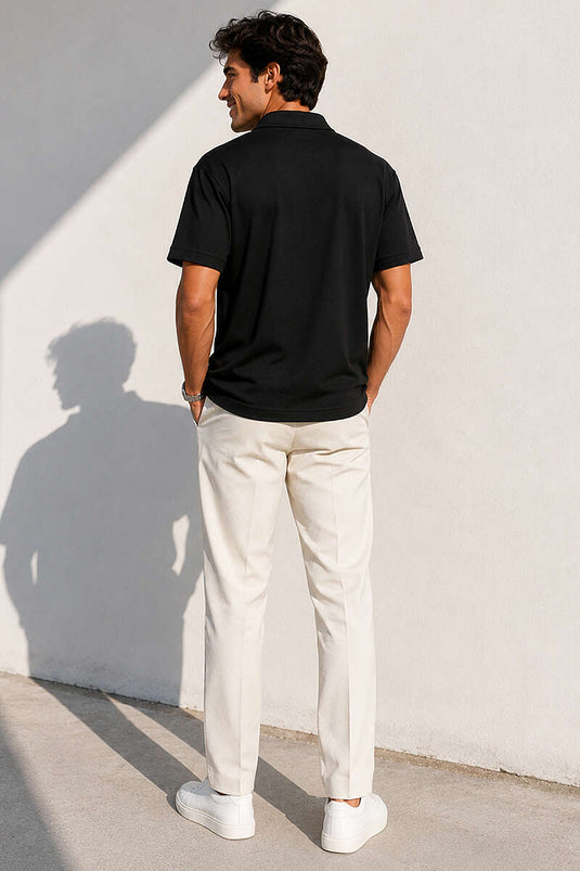 T-shirt homme noir à col polo avec demi-fermeture éclair
