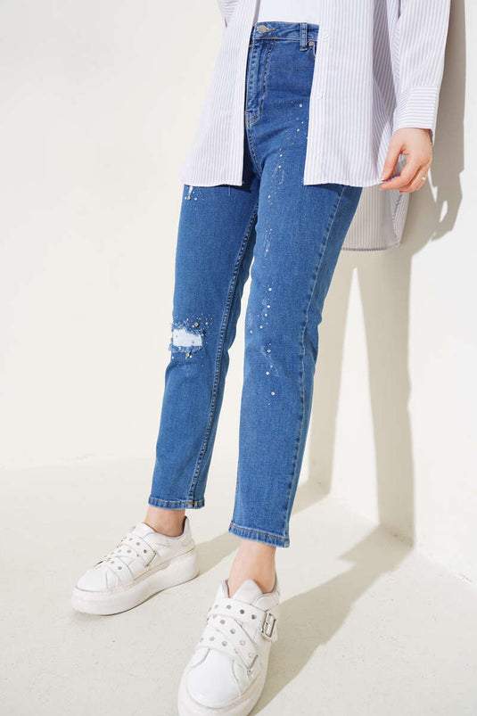 Pantalon en jean skinny déchiré et détaillé