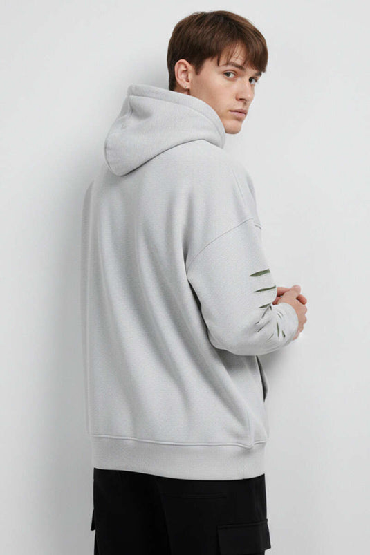 Sweat-shirt pour homme avec broderie effet déchiré couleur pierre