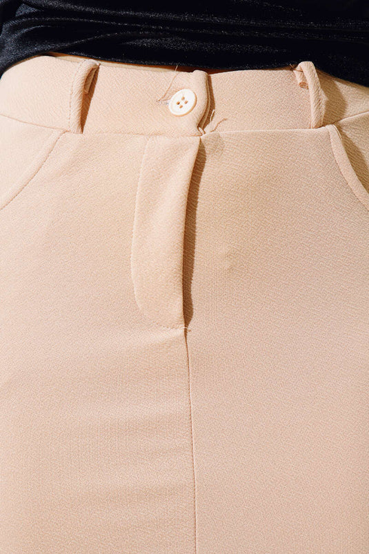 تنورة ميدي بفتحة لون جمل