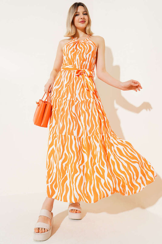 فستان برتقالي بدون أكمام بربطة عنق ونمط حمار وحشي