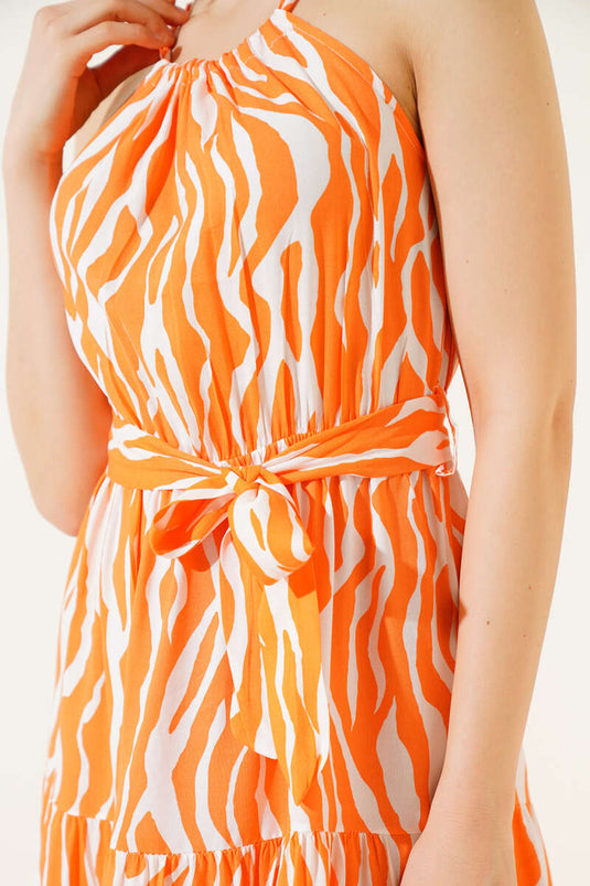 فستان برتقالي بدون أكمام بربطة عنق ونمط حمار وحشي