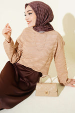 Pull en tricot motif zèbre latte