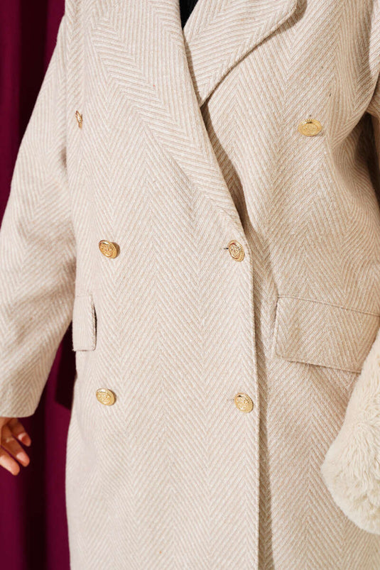 Manteau en cachemire beige à rayures en zigzag