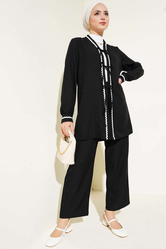 Ensemble deux pièces à lacets et détails en zigzag noir