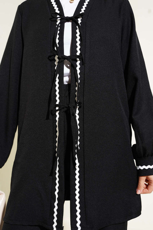 Ensemble deux pièces à lacets et détails en zigzag noir