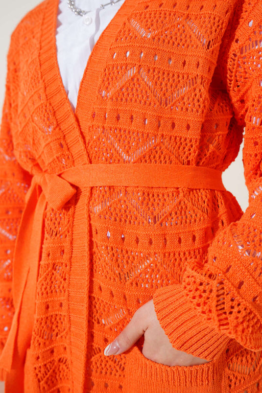 Cardigan en tricot à ceinture et à trous avec motif zigzag orange