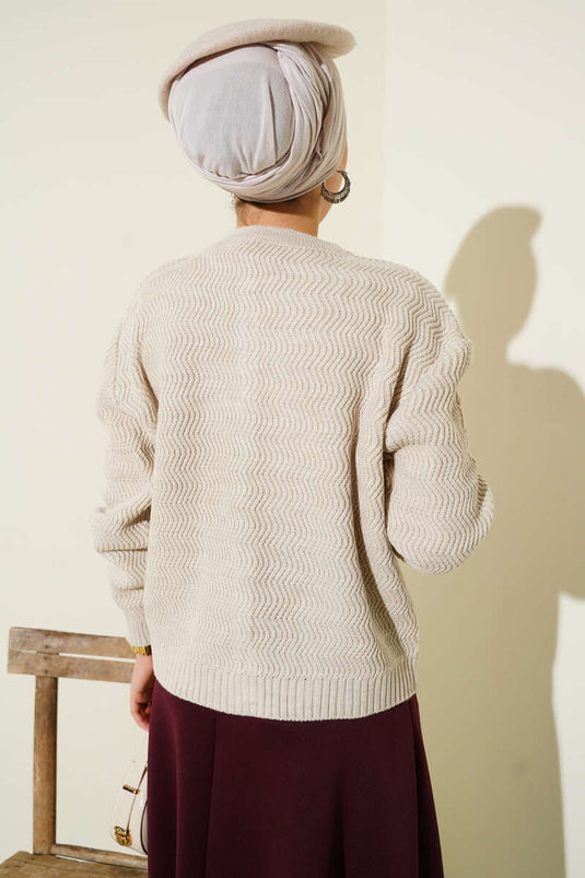 Cardigan en maille boutonnée dorée à motifs zigzag beige