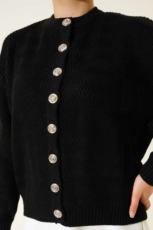 Cardigan en maille boutonnée dorée à motifs zigzag noir