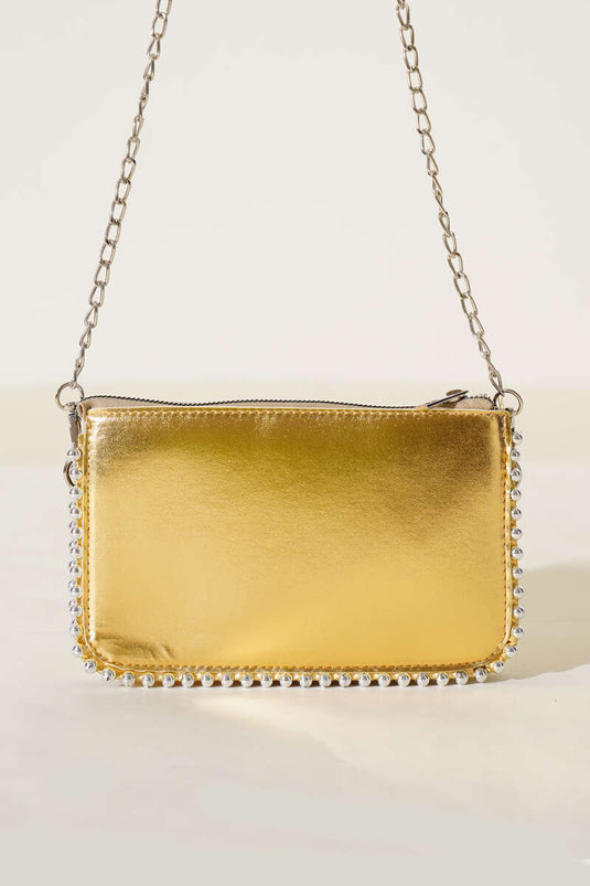 Sac bandoulière à chaîne cloutée dorée