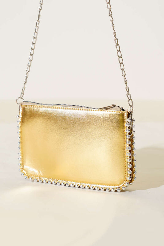 Sac bandoulière à chaîne cloutée dorée