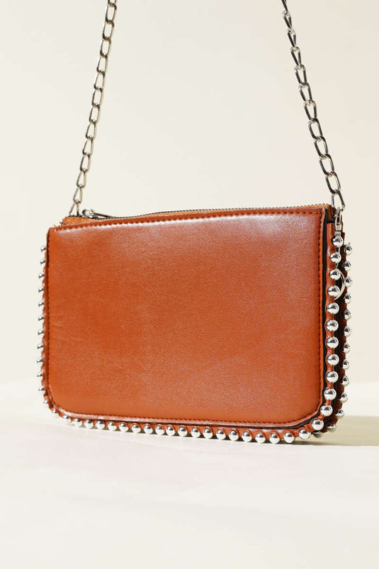 Sac à bandoulière chaîne clouté beige